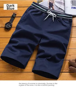 Detail of navy blue men's casual shorts showing elastic waistband and white drawstring