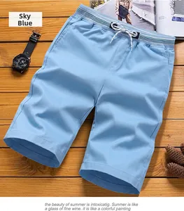 Detail of sky blue casual shorts with striped elastic waistband and drawstring