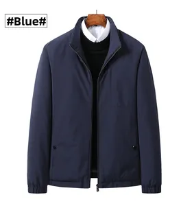 Detail of blue men's stand collar down jacket featuring zipper pockets and elastic cuffs