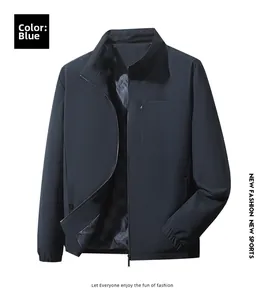 Detailed close-up of dark blue jacket with functional zipper pocket and stand collar