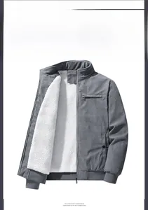 Detail of grey corduroy jacket featuring white sherpa lining and ribbed cuffs