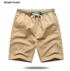 Detailed front view of khaki casual shorts featuring elastic waist with white drawstring