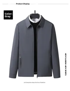 Detail of grey business jacket showing lapel collar, zipper pockets and smooth fabric