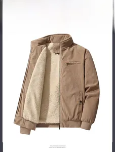 Detail of khaki corduroy jacket showing thick cream sherpa fleece lining and XL size tag