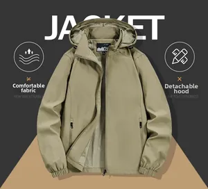 Detail of outdoor jacket with detachable hood and breathable khaki fabric texture