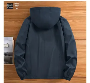 Back view of navy blue hooded casual jacket with elastic cuffs on wooden background