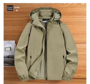 Detail view of khaki outdoor hooded jacket with zipper pockets and windproof fabric