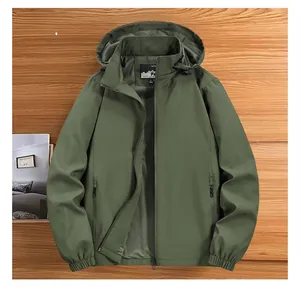 Detailed close-up of army green hooded jacket showing breathable mesh lining and size tag