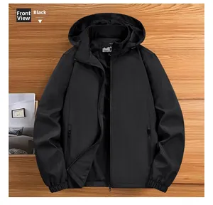 Detail of black outdoor jacket featuring breathable mesh lining and a detachable hood