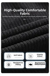 Macro detail of black corduroy fabric showing vertical texture and soft breathable material