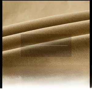 Detailed fabric texture of khaki jacket showing breathable, skin-friendly, anti-pilling features