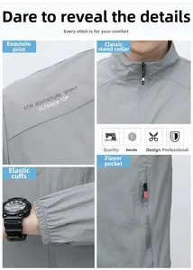 Detail view of light grey sun protection jacket with stand collar and zipper pockets