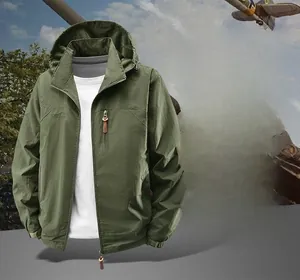 Detail of army green hooded jacket showing adjustable hood and chest zipper pocket