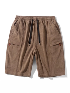 Men's brown corduroy shorts with elastic drawstring waist and stylish minimalist design