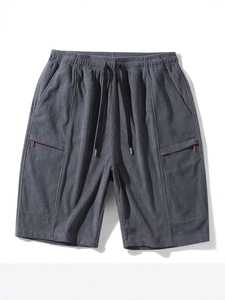 Dark grey corduroy summer shorts for men featuring elastic drawstring waist and zip pockets