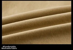 Macro shot of comfortable khaki washed cotton fabric with fine twill texture and soft feel