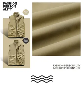 Detail view of the reversible multi-pocket outdoor khaki vest with stand collar texture