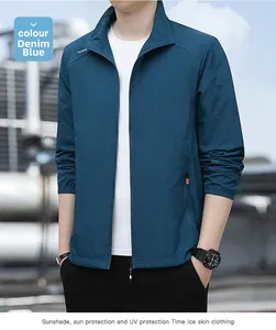 Detail of denim blue sun protection jacket showing stand collar and outdoor shoulder logo