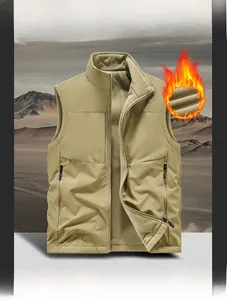 Close-up of khaki outdoor vest with fleece lining and zipper pockets for warmth