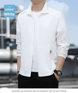 Detail of white sun protection jacket showing the high collar and adventure slogan on shoulder