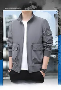 Detailed view of grey standing collar jacket with multi-pocket utility design features