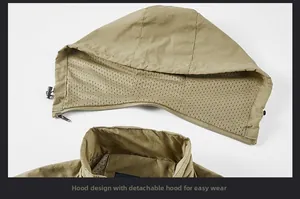 Detail view of khaki hooded jacket featuring a detachable zipper and breathable mesh lining