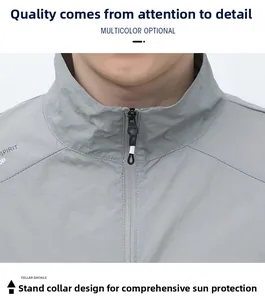 Detail of grey men's sun protection jacket featuring stand collar and zipper close-up