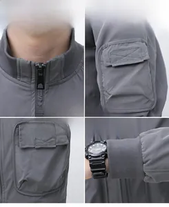 Detail view of ribbed collar, tactical pockets, and durable zipper on dark grey jacket