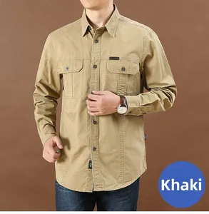 Detailed close-up of khaki cotton twill work shirt with double chest pockets and dark buttons