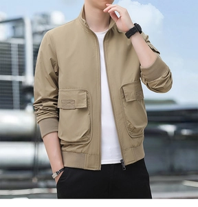 Detail of khaki men's stand collar jacket featuring large utility cargo pockets and zip closure