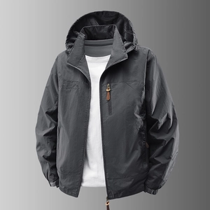 Men's outdoor hooded windbreaker jacket with multiple zipper pockets in charcoal grey
