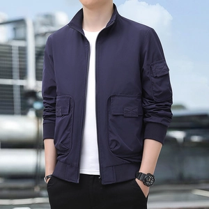 Men's navy blue mountain style cargo jacket with stand collar and tactical utility pockets