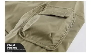 Detail of khaki jacket sleeve pocket with velcro closure and white contrast stitching