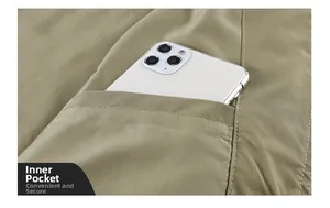 Detail of a functional inner pocket on a bomber jacket with a smartphone for scale