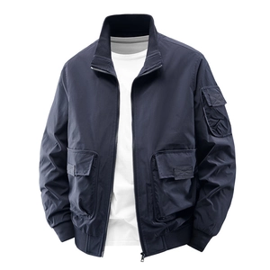 Men's navy blue bomber jacket with stand collar and tactical arm pocket on white background