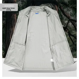 Inner view of light grey quick-dry sun protection jacket showing lining and neck label