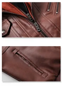 Dettaglio della giacca in pelle marrone con cerniere in metallo e fodera in pile arancione