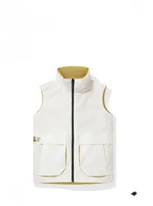 Close-up of white vest with stand-up collar, yellow contrast lining and 3D pockets