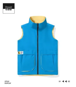 Detail of lake blue utility vest featuring contrasting yellow lining and large front pockets