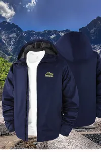 Detail of waterproof outdoor jacket showing breathable mesh lining and embroidery