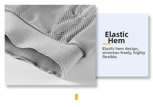 Detail of grey mesh vest featuring an elastic ribbed hem for a comfortable athletic fit