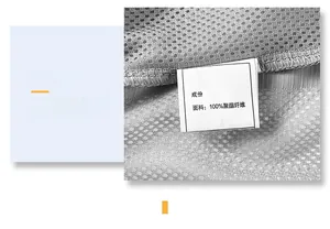 Detail of grey mesh fabric texture and wash label on polyester vest for men