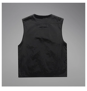 Back view of black tactical utility vest made of durable textured nylon material