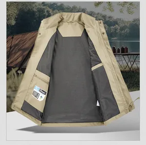Detail of outdoor utility vest featuring black mesh lining and zippered inner pocket