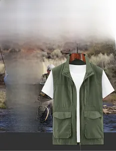 Close-up of military green outdoor vest with large utility pockets and stand collar