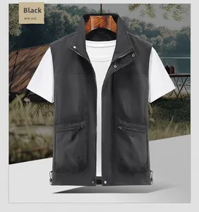 Close-up of black tactical vest with zipper pockets and high stand collar for outdoor wear