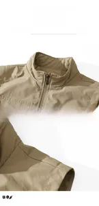 Nahaufnahme von Kragen und Ärmeln der khakifarbenen Outdoor-Weste aus Twill-Gewebe