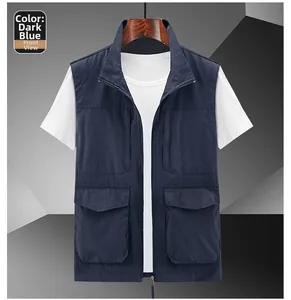 Detail view of dark blue outdoor vest with multi-pocket design and zip closure