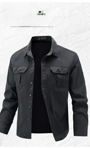 Detail of dark grey outdoor work shirt featuring durable grid texture and flap pockets