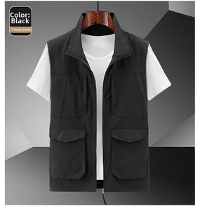Front detail of black outdoor vest featuring multi-pocket utility and full-zip design